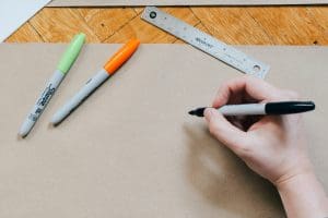 person-drawing-with-markers