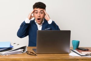 surprised-man-with-laptop