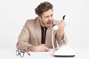 man-yelling-at-phone