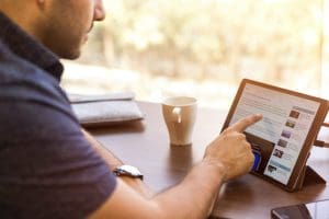 man using tablet computer